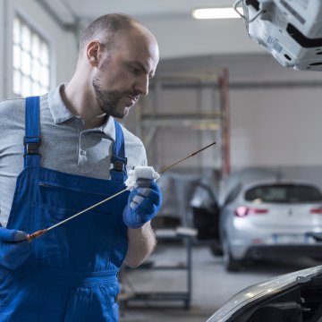 Mechanic checking a car 